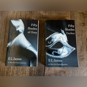 Fifty shades of grey and Fifty shades Darker by E L James. Excellent condition.